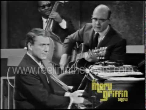 Merv Griffin Gets A Ride On A Marconi Mark IV